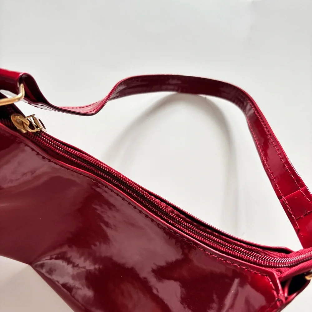 burgundy shoulder bag with gold zipper
